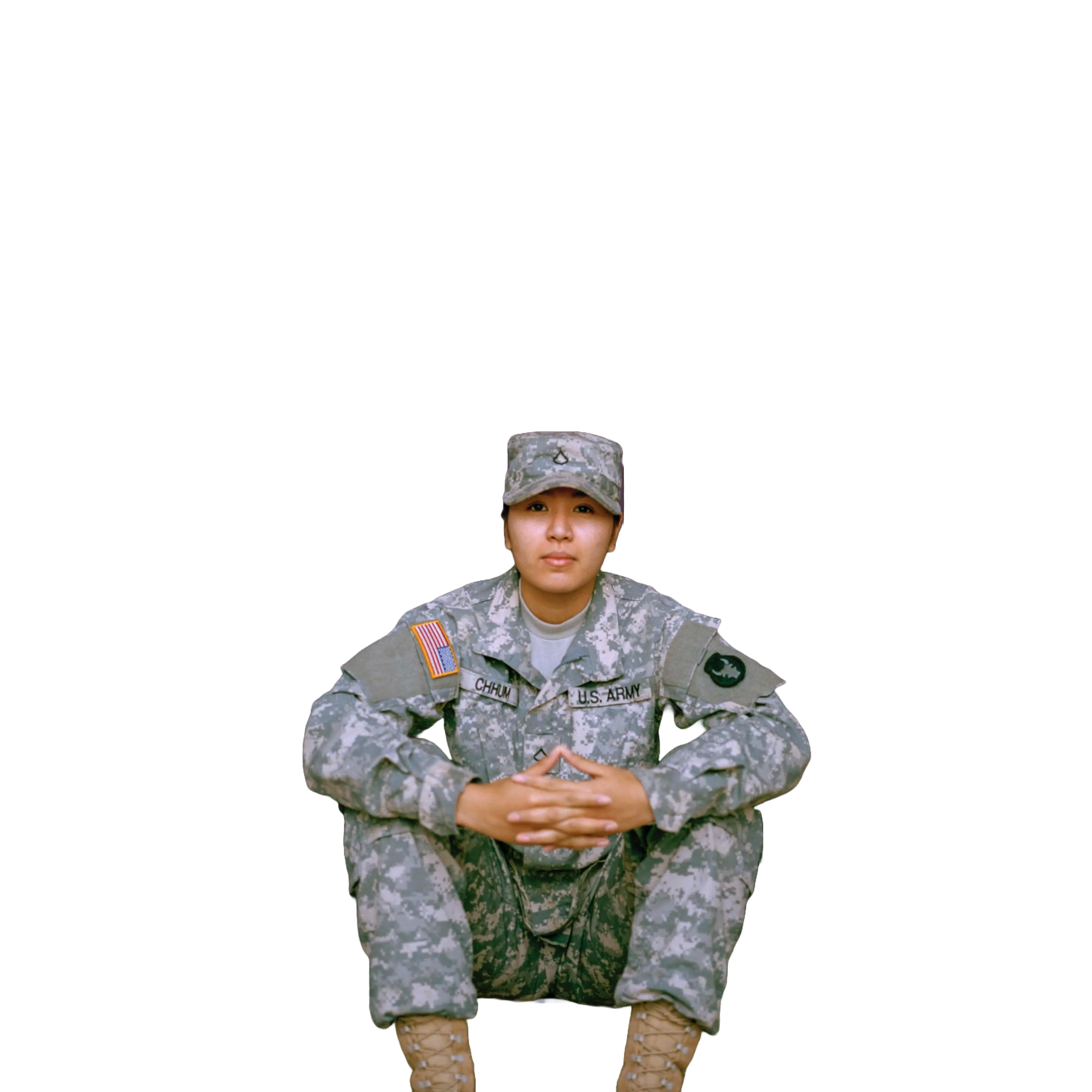 Picture of a smiling Marine veteran with his arms crossed.